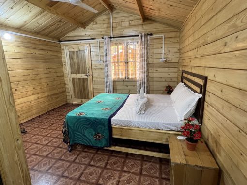Happy Shack Bedroom Bedroom inside charming wooden cottage at Happy Shack, near Colva, South Goa