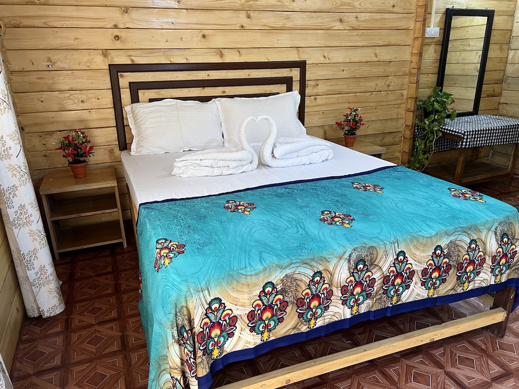 Happy Shack Bedroom Bed in wooden beach hut